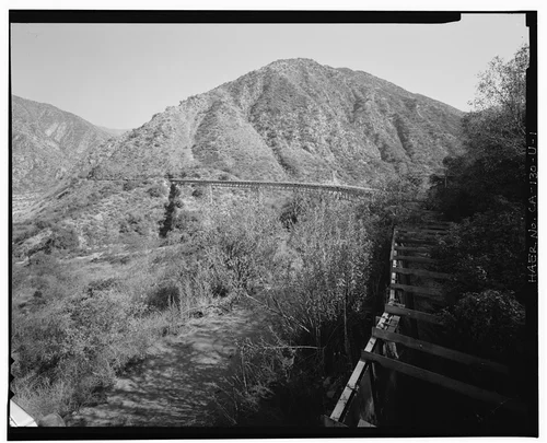  HIGH FLUME CROSSING WARM SPRINGS CANYON. VIEW TO NORTHEAST. - Santa Ana River Hydroelectric System, Warm Springs Canyon-SAR-3 Flumes, Redlands, San Bernardino County, CA
