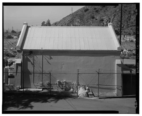  EAST ELEVATION, WITH PENSTOCK ENTERING POWERHOUSE. VIEW TO WEST-SOUTHWEST. - Santa Ana River Hydroelectric System, SAR-3 Powerhouse, Redlands, San Bernardino County, CA