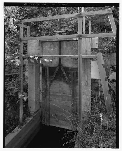  GATE AT ENTRY PORTAL TO TUNNEL #3. VIEW TO SOUTH-SOUTHWEST. - Santa Ana River Hydroelectric System, Sandbox at Breakneck Creek, Redlands, San Bernardino County, CA