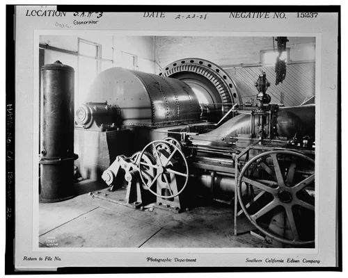  ORIGINAL DOUBLE WATERWHEELS, GENERATOR, AND GOVERNOR. SCE negative no. 15237, February 23, 1928. Photograph by G. Haven Bishop. - Santa Ana River Hydroelectric System, SAR-3 Powerhouse, Redlands, San Bernardino County, CA