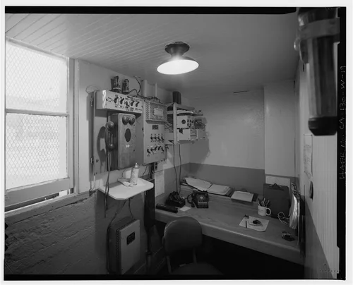  INTERIOR OF OPERATOR'S BOOTH, WITH MANUAL TELEPHONE AND SWITCHES. VIEW TO SOUTHWEST. - Santa Ana River Hydroelectric System, SAR-3 Powerhouse, Redlands, San Bernardino County, CA