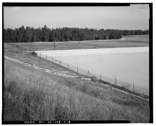  EAST END OF SPILLWAY, NORTH END, SHOWING ROCK AND CONCRETE DRAINAGE CHANNEL - Prado Dam, Spillway, Santa Ana River near junction of State Highways 71 & 91, Corona, Riverside County, CA