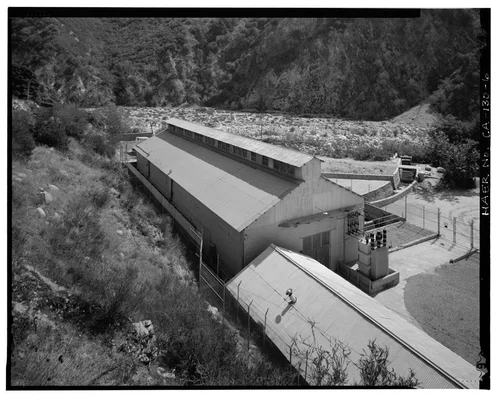  SAR-1, WITH ROOF OF MACHINE SHOP AT LOWER RIGHT, AND TAILRACE BEYOND. VIEW TO SOUTHEAST. - Santa Ana River Hydroelectric System, Redlands, San Bernardino County, CA