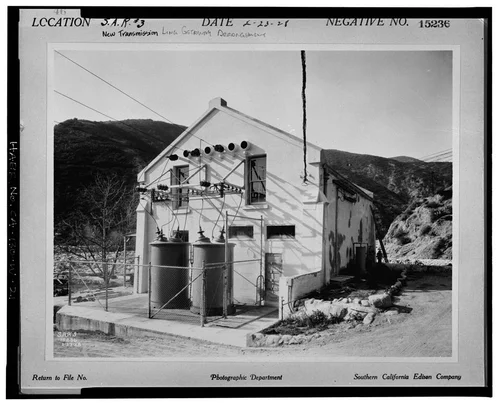  SOUTH ELEVATION, SHOWING NEW TRANSMISSION LINE GETAWAY ARRANGEMENT. SCE negative no. 15236, February 23, 1928. Photograph by G. Haven Bishop. - Santa Ana River Hydroelectric System, SAR-3 Powerhouse, Redlands, San Bernardino County, CA
