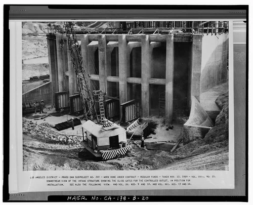  DOWNSTREAM VIEW OF THE INTAKE STRUCTURE, SHOWING THE SLIDE GATES FOR THE CONTROLLED OUTLET, IN POSITION FOR INSTALLATION.... Volume XVII,  No. 15, November 13, 1939. - Prado Dam, Outlet Works, Santa Ana River near junction of State Highways 71 & 91, Corona, Riverside County, CA