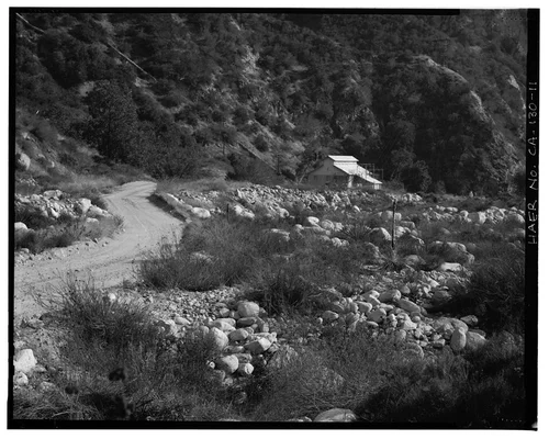  SAR-2, SHOWING OVERFLOW PIPE ALONGSIDE BURIED PENSTOCK. VIEW TO SOUTH-SOUTHEAST. - Santa Ana River Hydroelectric System, Redlands, San Bernardino County, CA