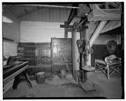  NORTHWEST WALL OF INTERIOR, SHOWING TOOL BOARD AND DRILL PRESS. VIEW TO NORTHWEST. - Santa Ana River Hydroelectric System, SAR-1 Machine Shop, Redlands, San Bernardino County, CA