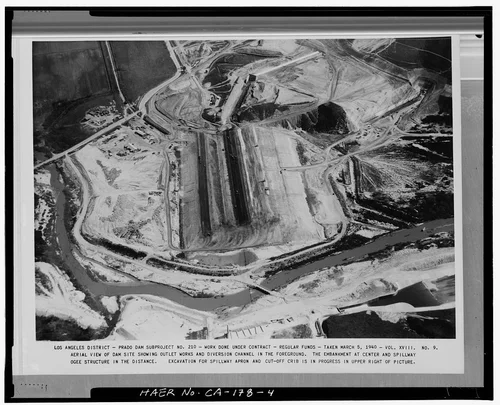  AERIAL VIEW OF DAM SITE SHOWING OUTLET WORKS AND DIVERSION CHANNEL IN FOREGROUND.... Volume XVIII, No. 9, March 5, 1940. - Prado Dam, Santa Ana River near junction of State Highways 71 & 91, Corona, Riverside County, CA
