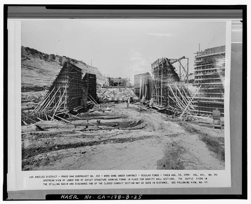  UPSTREAM VIEW OF LOWER END OF OUTLET STRUCTURE SHOWING FORMS IN PLACE FOR GRAVITY WALL SECTIONS.... Volume XVI, No. 16, August 16, 1939. - Prado Dam, Outlet Works, Santa Ana River near junction of State Highways 71 & 91, Corona, Riverside County, CA