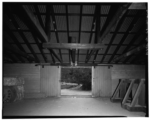  HAYLOFT SLIDING DOORS WITH PULLEY SUPPORTS. VIEW TO SOUTHEAST. - Santa Ana River Hydroelectric System, SAR-1 Stable, Redlands, San Bernardino County, CA
