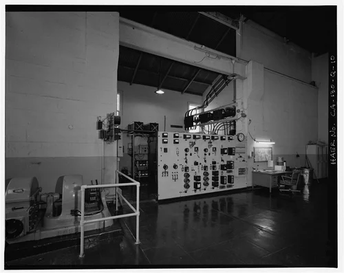  INTERIOR VIEW TO WEST, SHOWING EXCITER, RHEOSTATS, DISCONNECT PANEL WITH BUS ABOVE, AND OPERATOR'S DESK. - Santa Ana River Hydroelectric System, SAR-2 Powerhouse, Redlands, San Bernardino County, CA
