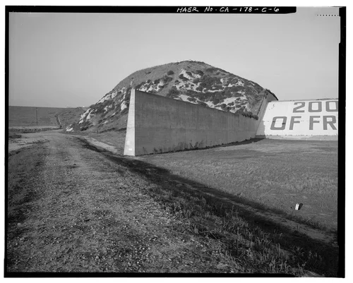  CONCRETE WING WALL AT NORTHWEST END OF SPILLWAY; DAM EMBANKMENT AT LEFT. - Prado Dam, Spillway, Santa Ana River near junction of State Highways 71 & 91, Corona, Riverside County, CA