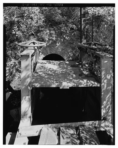  GATE AT EXIT PORTAL TO TUNNEL #2. VIEW TO NORTHEAST. - Santa Ana River Hydroelectric System, Sandbox at Breakneck Creek, Redlands, San Bernardino County, CA