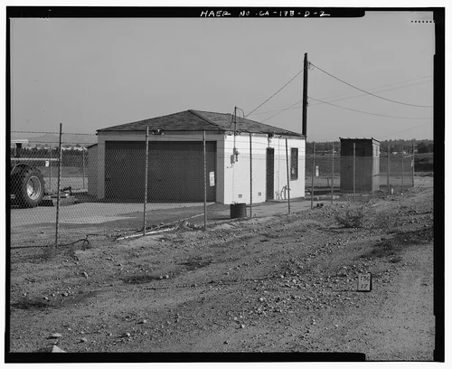  GARAGE AT EAST END OF EMBANKMENT, SOUTH AND WEST SIDES. - Prado Dam, Service Vehicle Garage, Santa Ana River near junction of State Highways 71 & 91, Corona, Riverside County, CA