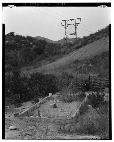  GRAVE SITE BETWEEN SAR-2 AND SAR-3, ALSO SHOWING METAL TRANSMISSION TOWER. VIEW TO NORTH-NORTHWEST. - Santa Ana River Hydroelectric System, Redlands, San Bernardino County, CA