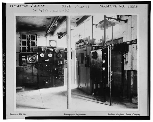  SWITCHBOARD (LEFT) AND TELEPHONE BOOTH (RIGHT). SCE negative no. 15238, February 23, 1928. Photograph by G. Haven Bishop. - Santa Ana River Hydroelectric System, SAR-3 Powerhouse, Redlands, San Bernardino County, CA