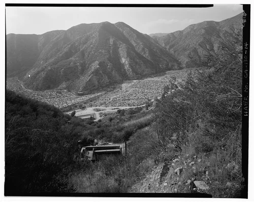  LOOKING STEEPLY DOWN AT SAR-2 FOREBAY, THE POWERHOUSE, AND THE SANTA ANA RIVER CANYON. VIEW TO WEST-NORTHWEST. - Santa Ana River Hydroelectric System, Redlands, San Bernardino County, CA