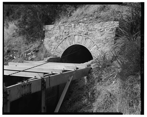  DETAIL OF ENTRY TUNNEL PORTAL, FOURTH FLUME ABOVE SAR-1 FOREBAY. VIEW TO WEST. - Santa Ana River Hydroelectric System, Flumes & Tunnels below Sandbox, Redlands, San Bernardino County, CA
