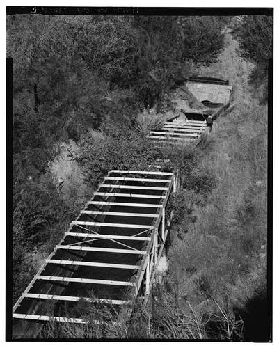  EXIT TUNNEL PORTAL AND SECOND FLUME ABOVE SAR-1 FOREBAY. VIEW TO NORTHWEST. - Santa Ana River Hydroelectric System, Flumes & Tunnels below Sandbox, Redlands, San Bernardino County, CA