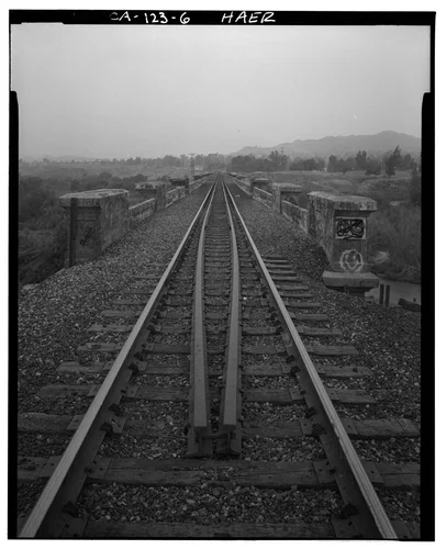  VIEW LOOKING WEST ACROSS BRIDGE ALONG RAILROAD TRACKS - Union Pacific Railroad Bridge, Spanning Santa Anna River, west of Riverside, Riverside, Riverside County, CA
