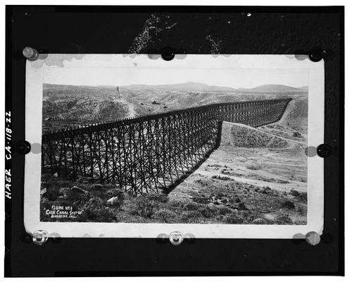  Photocopy of photograph (original print at Gage Canal Company Office), photographer and date unknown. 'FLUME NO. 9, 'GAGE CANAL SYSTEM,' RIVERSIDE, CAL.' VIEW OF FLUME OVER TEQUESQUITE ARROYO. - California Citrus Heritage Recording Project, Riverside, Riverside County, CA