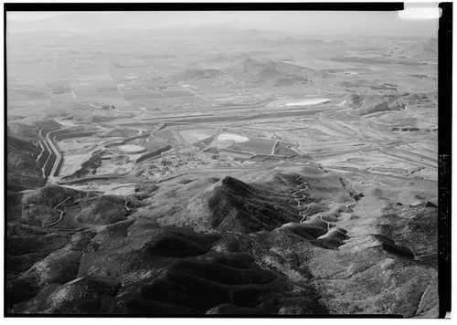  EASTSIDE RESERVOIR, LOOKING WEST. WEST DAM UNDER CONSTRUCTION, QUARRIES TO LEFT MIDDLE GROUND OF PICTURE. - Eastside Reservoir, Diamond & Domenigoni Valleys, southwest of Hemet, Hemet, Riverside County, CA