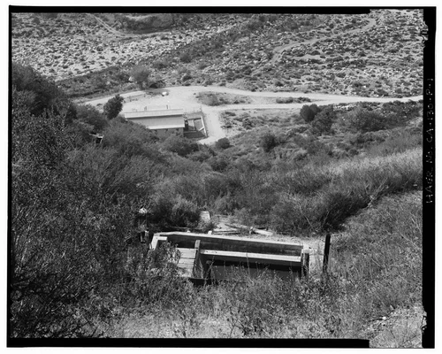  VIEW STEEPLY DOWNSLOPE PAST SAR-2 FOREBAY TO SAR-2 POWERHOUSE, LOOKING WEST-NORTHWEST. - Santa Ana River Hydroelectric System, SAR-2 Forebay & Penstock, Redlands, San Bernardino County, CA