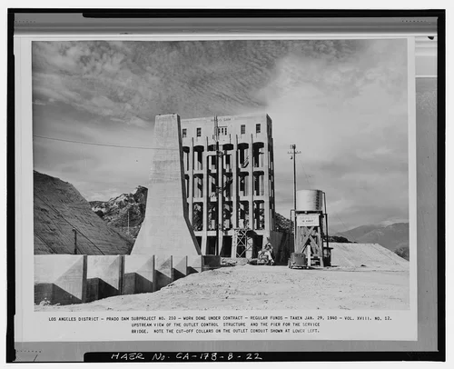  UPSTREAM VIEW OF THE OUTLET CONTROL STRUCTURE AND THE PIER FOR THE SERVICE BRIDGE.... Volume XVIII, No. 12, January 29, 1940. - Prado Dam, Outlet Works, Santa Ana River near junction of State Highways 71 & 91, Corona, Riverside County, CA