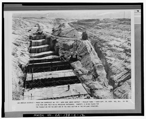  ...CONCRETE IS BEING PLACED FOR THE FOUNDATION FOR THE WEST END OF THE OGEE SECTION OF SPILLWAY STRUCTURE. Volume XVI, No. 20, September 29, 1939. - Prado Dam, Spillway, Santa Ana River near junction of State Highways 71 & 91, Corona, Riverside County, CA
