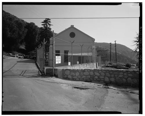  NORTH ELEVATION, SHOWING ADMINISTRATIVE OFFICES AT LEFT REAR, AND SWITCH RACK AT RIGHT REAR. VIEW TO SOUTH-SOUTHEAST. - Santa Ana River Hydroelectric System, SAR-3 Powerhouse, Redlands, San Bernardino County, CA