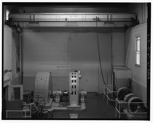  INTERIOR VIEW TO SOUTH, SHOWING CRANE AND GENERATOR #1. - Santa Ana River Hydroelectric System, SAR-2 Powerhouse, Redlands, San Bernardino County, CA