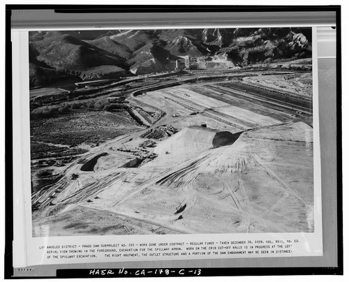  AERIAL VIEW SHOWING IN THE FOREGROUND, EXCAVATION FOR THE SPILLWAY APRON.... Volume XVII, No. 12, December 26, 1939. - Prado Dam, Spillway, Santa Ana River near junction of State Highways 71 & 91, Corona, Riverside County, CA