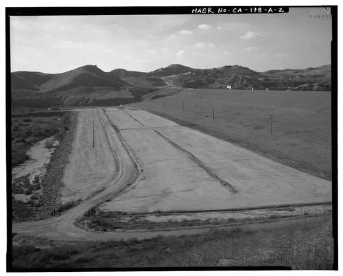  DOWNSTREAM FACE OF DAM, TO WEST. - Prado Dam, Embankment, Santa Ana River near junction of State Highways 71 & 91, Corona, Riverside County, CA