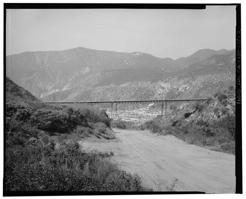  VIEW OF HIGH FLUME, LOOKING DOWN WARM SPRINGS CANYON TO SANTA ANA RIVER CANYON. VIEW TO WEST-NORTHWEST. - Santa Ana River Hydroelectric System, Warm Springs Canyon-SAR-3 Flumes, Redlands, San Bernardino County, CA