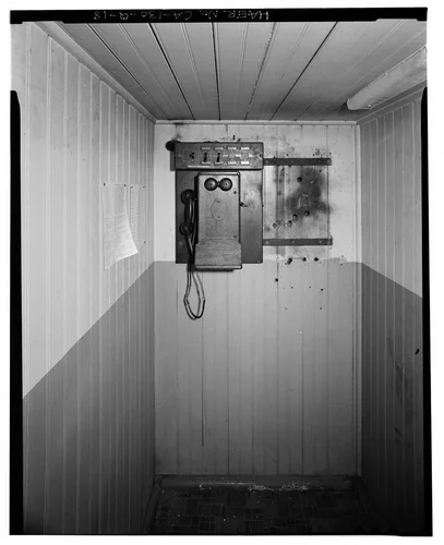  INTERIOR OF TELEPHONE BOOTH, LOOKING EAST. - Santa Ana River Hydroelectric System, SAR-2 Powerhouse, Redlands, San Bernardino County, CA