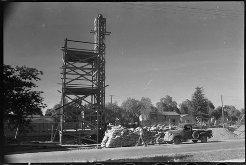 Formwork tower and Chevrolet AK truck, St Francis de Sales Auditorium construction, Riverside, California