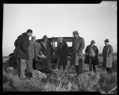 Men search for murder victim remains in the Mojave Desert during the Gordon Stewart Northcott case, Riverside, 1928-1929