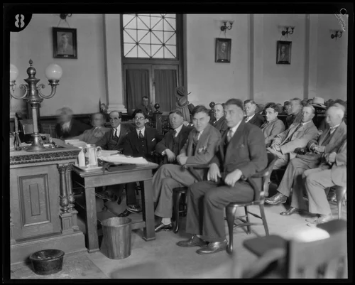 Gordon S. Northcott sits at the counsel's table with his defense attorneys, Riverside, circa 1929