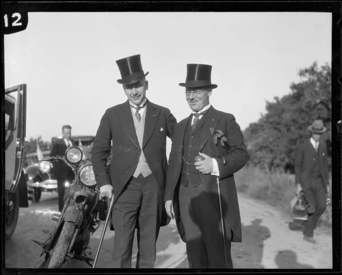 Two men with the party of people accompanying Crown Prince Gustav Adolf of Sweden during a visit to an orchard, Riverside, 1926