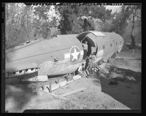 Surplus military cargo plane being transformed into a home in Riverside, Calif., 1947