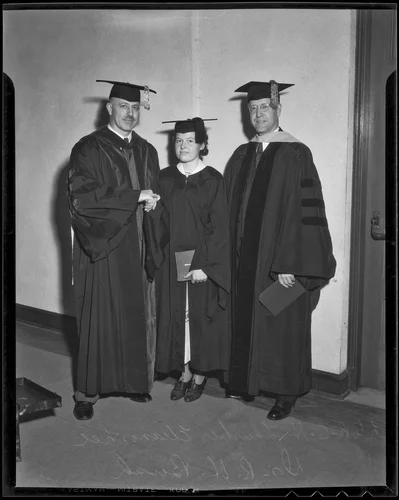 Eleanor Lee and Dr. Ralph H. Bush are congratulated by Dr. Clarence Thurber, Redlands, 1936