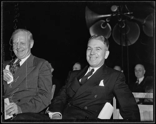 U.S. Undersecretary of Agriculture Rexford Tugwell, smiles for camera, Olympic Auditorium, 1935