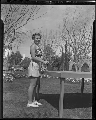 Phyllis Jeffrey plays table tennis on her vacation, Palm Springs, 1936