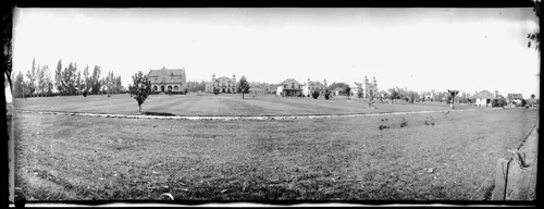 Row of homes on a residential street in Riverside, ca.1905