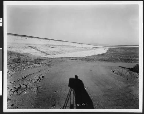 Inside of the Cajalco Reservoir, showing the height of the levee (ninety feet), Riverside, November 19, 1939
