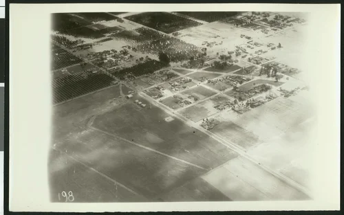 Aerial view of flooding of the Santa Ana River near Corona, ca.1930