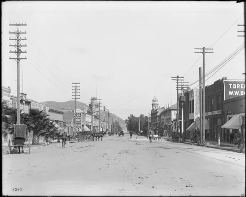 A view of Eighth Street in Riverside, looking west with Mount Rubidoux in background, ca.1900