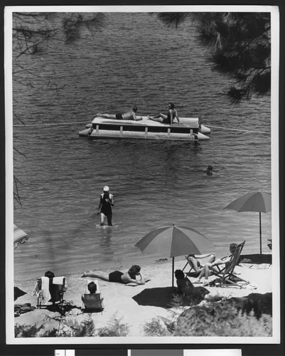 People sunbathing in Lake Arrowhead, ca.1950