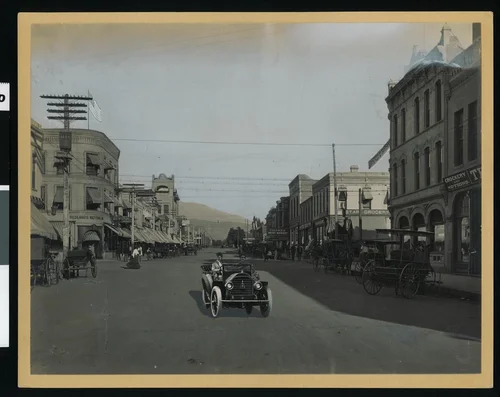 View of State Street, showing automobilists in Redlands, 1908