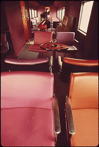 INTERIOR OF ONE OF THE AMTRAK PASSENGER TRAINS WHICH HAS BEEN REFURNISHED AT A PLANT IN MIRA LOMA, CALIFORNIA, NEAR RIVERSIDE IT IS ONE OF SEVERAL PLACES IN THE UNITED STATES WHERE EQUIPMENT IS OVERHAULED MECHANICALLY AND REPAINTED. WHAT CAN BE RECONDITIONED IS REUSED, BUT MUCH OF THE INTERIORS ARE REPLACED WITH MORE MODERN MATERIALS